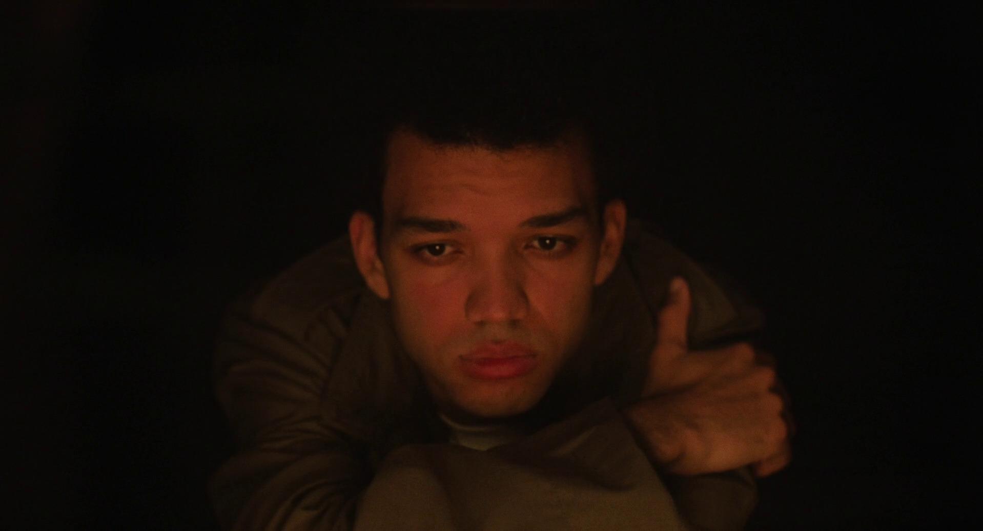 Owen in front of a campfire